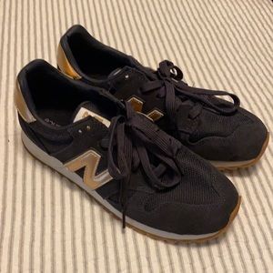 New Balance navy and rose gold accent